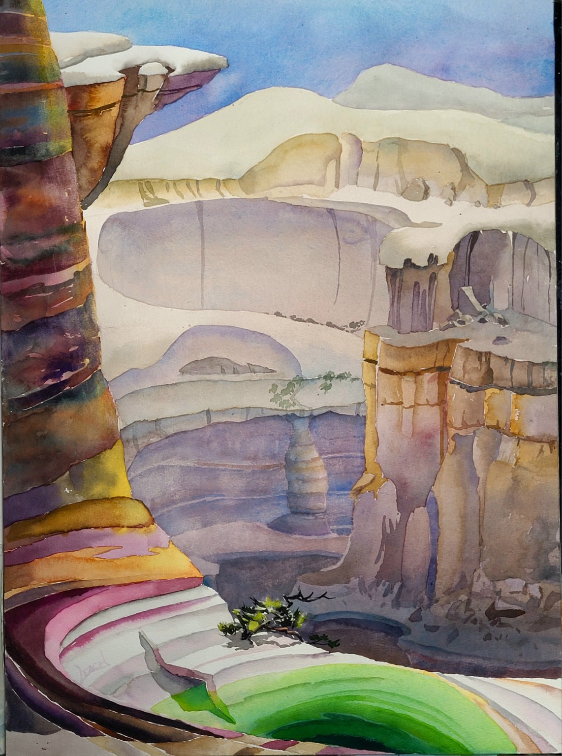 A bright green pool among layered canyon walls